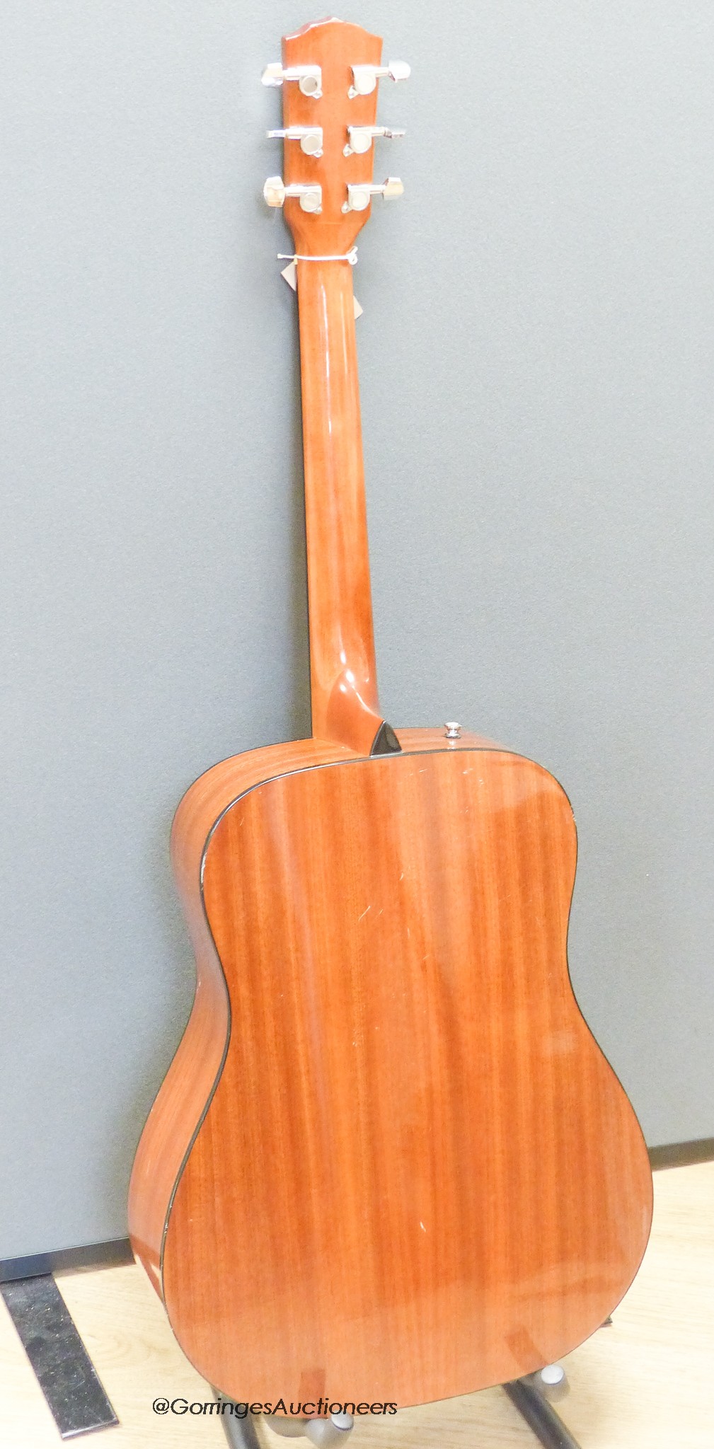 A fender acoustic guitar CD 60/5B